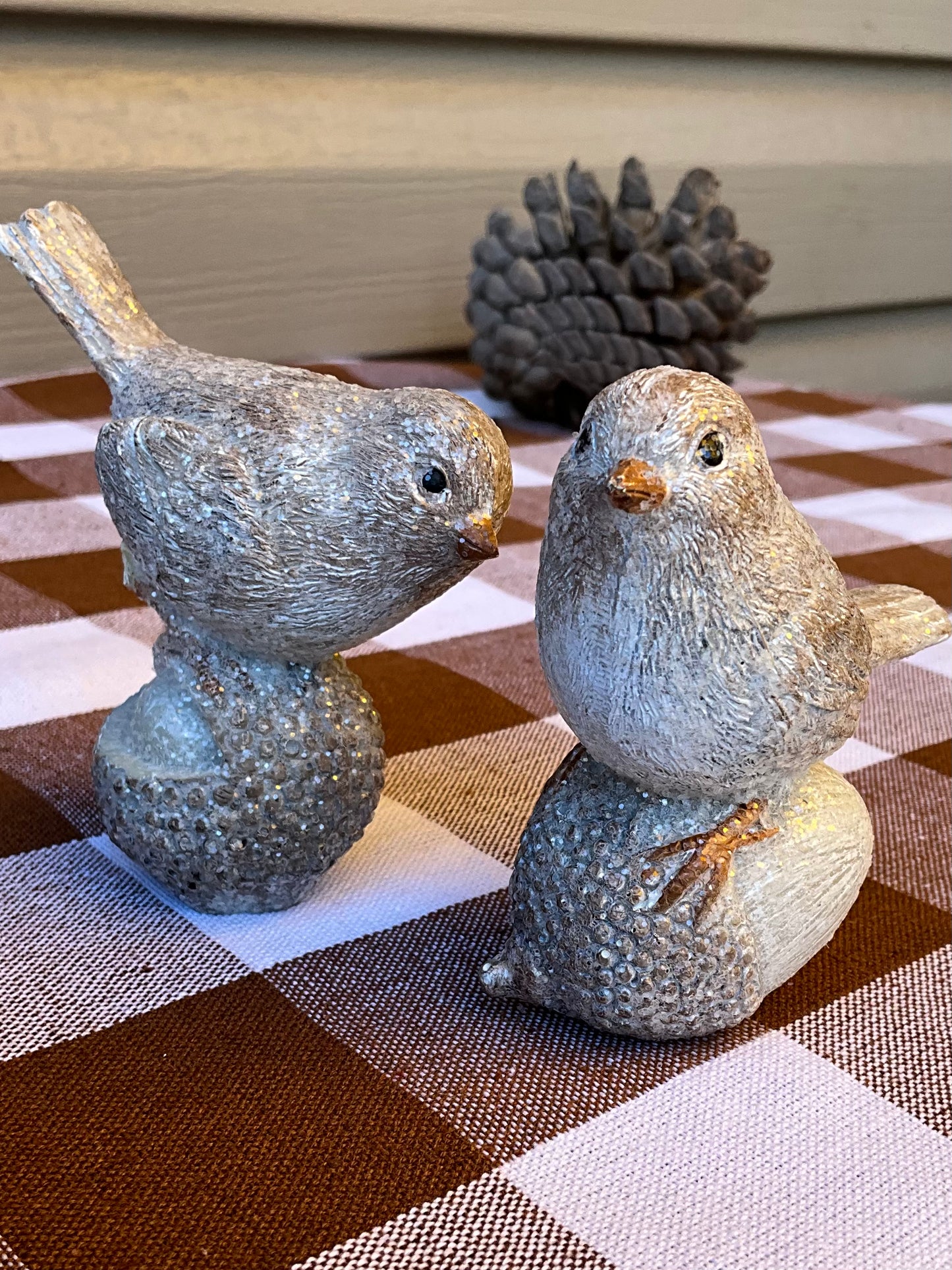 Small Birds on Acorns