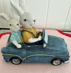 Bunnies in Blue Car