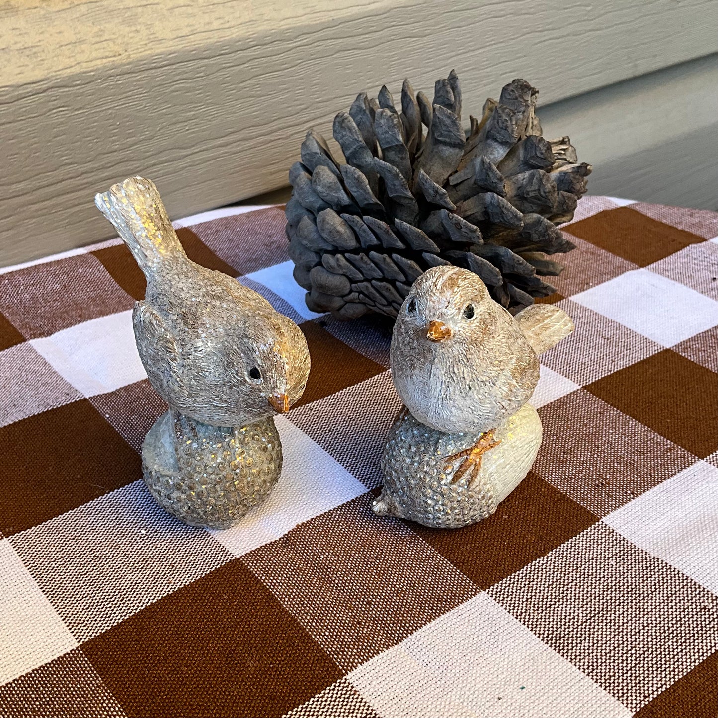 Small Birds on Acorns