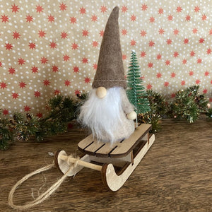 Gnome on a Wooden Sleigh