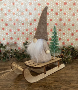 Gnome on a Wooden Sleigh