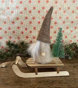 Gnome on a Wooden Sleigh