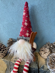 Gnome Holding Skis